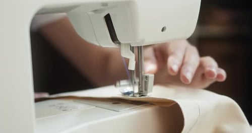 Close Up of Sewing Machine Stitching Fabric