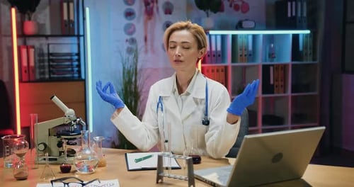Woman Meditating in a Science Lab