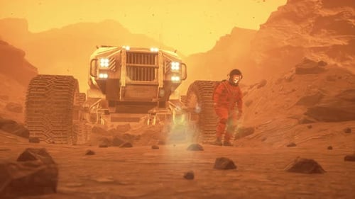 Astronaut Explores Red Planet, Examines Rock Near Space Rover