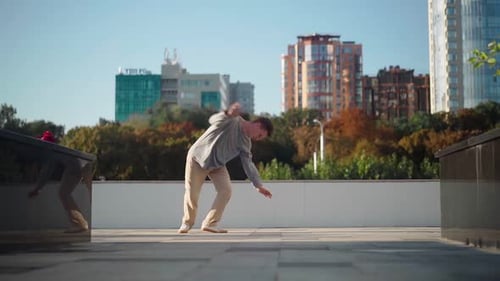 Stylish Caucasian Man in Sunglasses Street Dancer Dancing Break Dance Background Urban Architecture