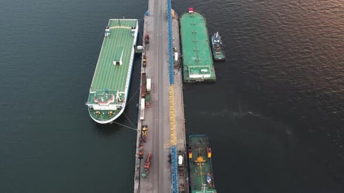 Aerial view of Yacht and boats docking at the marina in the evening.