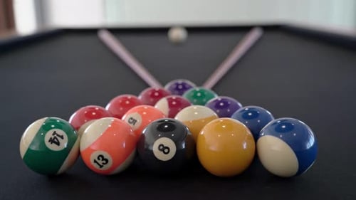 Closeup of a Billiard Table with Balls and Cue for Gambling Indoors