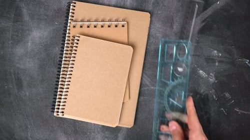 stack of notebooks with blank sheets