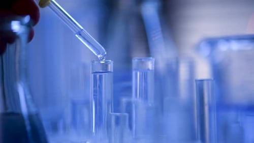 Liquid Added to Test Tube in Laboratory Experiment