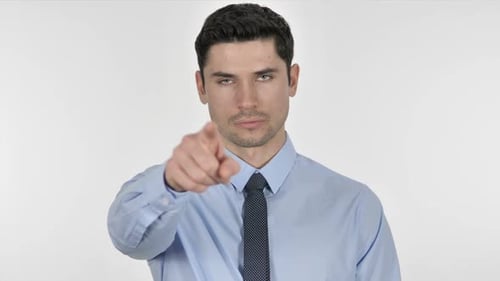 Man Points Directly at Viewer with Confidence