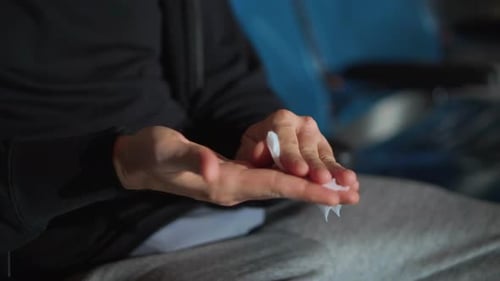 Adult's Hands Cleaning with Wipe, Close Up