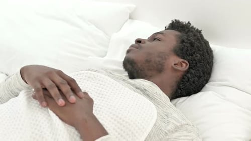 Uncomfortable African Man Cannot Sleep
