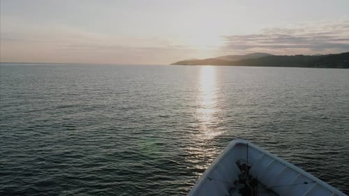 Boating/yachting near West Vancouver, BC near a mountain.