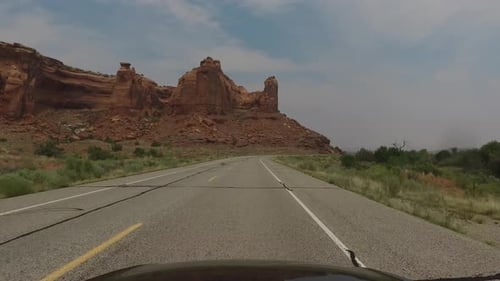 POV driving down scenic road in South West USA