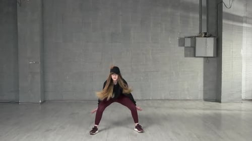 Female Modern Style Dancer Dancing in Studio