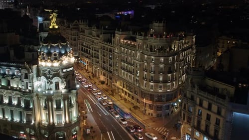 Night Timelapse of Gran Via Street, Madrid. Traffic Flow and Metropolis Building