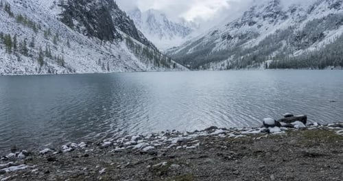 Snow Mountain Lake Timelapse at the Autumn Time. Wild Nature and Rural Mount Valley. Green Forest of