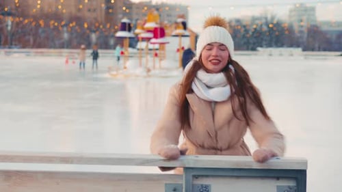 Young Smiling Woman Ice Skating Outside on Ice Rink Central City Square at Christmas Holiday Active