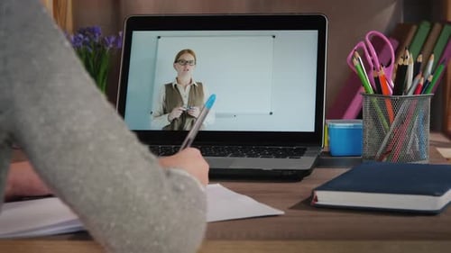 Student Attending Online Class, Taking Notes