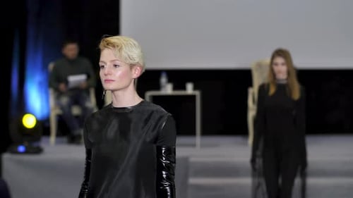 Models walk the runway at a fashion show