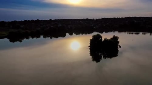 Reflection of sun in water. Aerial view of reflection of sunset in the water