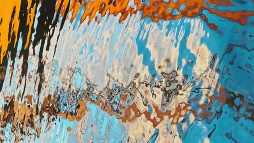 Reflection of Orange and Deep Blue Color of River Ripple Waves