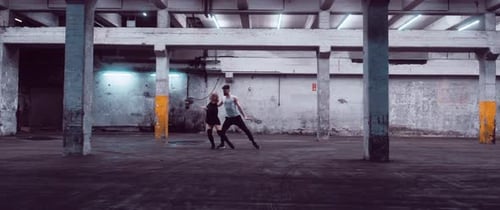 Dancers in a Parking Lot