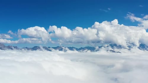 Snow Covered And Clouds Mountains