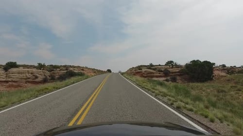POV driving down scenic road in South West USA
