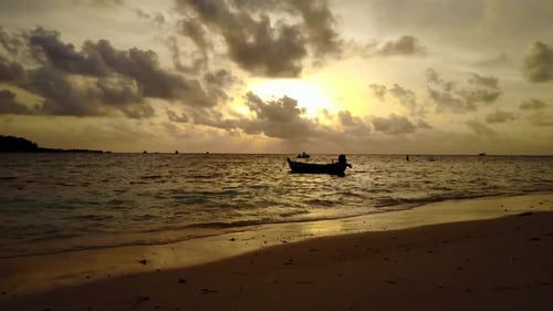 Aerial flying over tourism of beautiful shore beach break by shallow ocean and white sand background