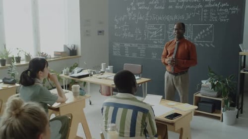 African American Professor Teaching Students in University