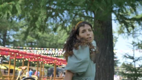 Young Couple Dancing Together in Urban Park