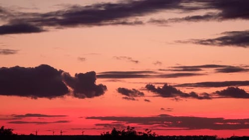 Colorful Sunset Sky with Dark Clouds