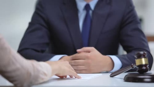 Judge Rejects Bribe in Office with Gavel