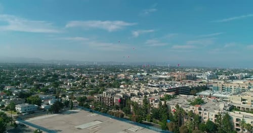 Colorful Balloons - Festive. Party. Rise Up To a Cloudy, Sunny Sky. Aeria