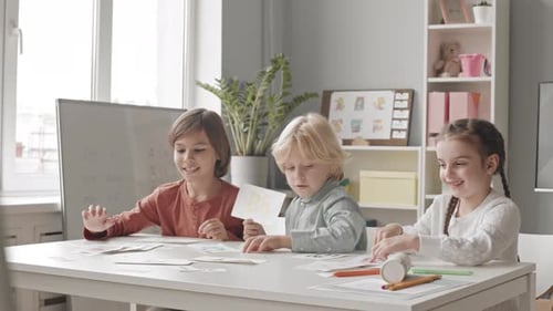 Three Children at Speech Therapy Lesson