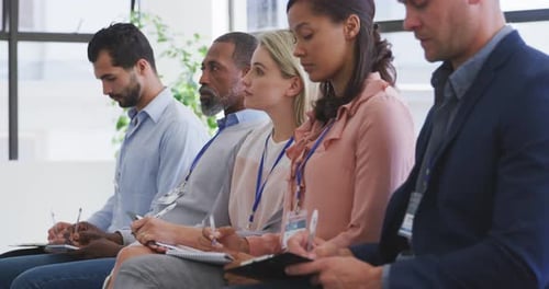 Business people attending to a meeting in conference room