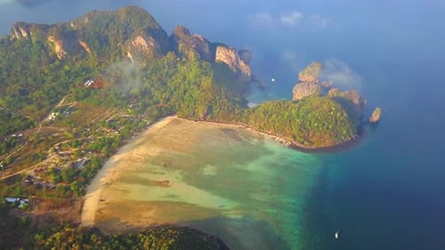 Aerial view of Phi Phi, Maya beach at sunset with Andaman sea in Phuket. Thailand