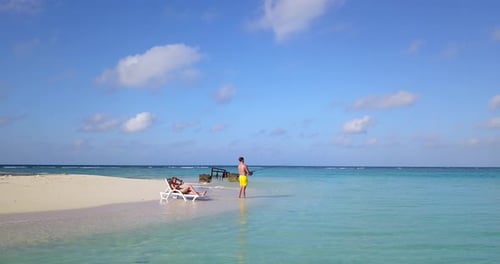 Romantic people after marriage in love have fun on beach on white sand background 4K