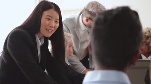 Multiracial Business People Working Together Inside Modern Bank Office