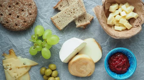 Cheese, Bread, and Grapes Appetizer Laid Flat