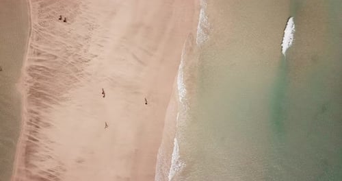 Beautiful beach with sea transparent clean water on both sides. Island concept travel destination.