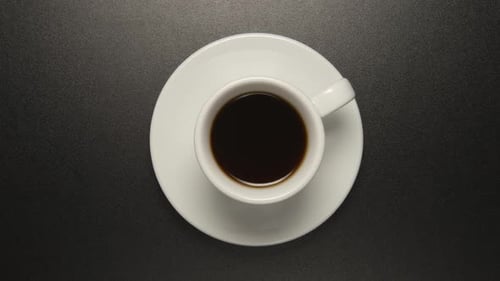 Coffee Cup Still Life on Black Background