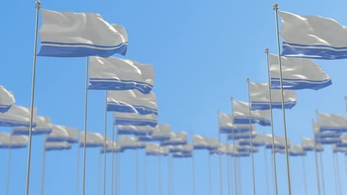 Generic White and Blue Flags Waving Against a Clear Blue Sky