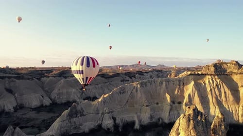 Hot Air Balloons Flying Over Cappadocia at Sunrise