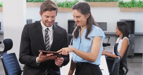 Team Collaboration with Tablet in a Modern Office