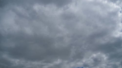 Time-Lapse of Gray Clouds Passing Overhead