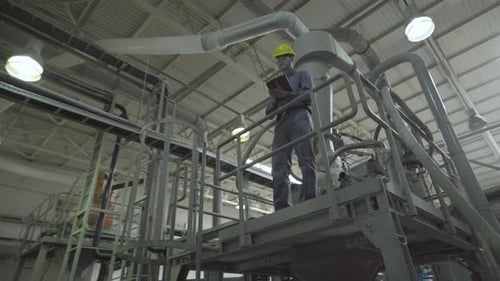 Engineer using digital tablet