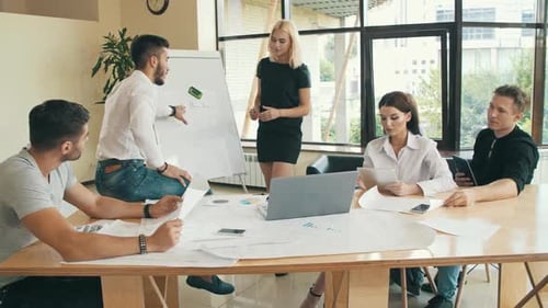 Team of Young Businessman Working at Office