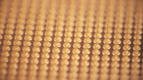 Extreme Close Up Of A Gold Microchip