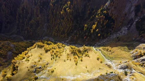 Aerial view of a mountain valley in autumn season. Mountain ridge.