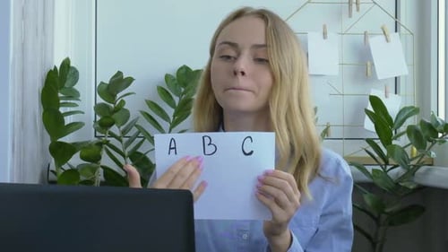 Woman Teaching Online Lesson From Home