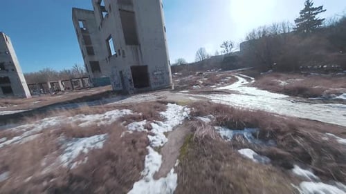 FPV Drone Flies Quickly and Maneuverably Among the Ruins of Industrial Buildings
