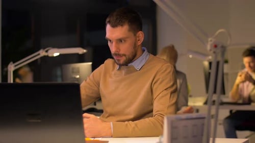 Office Workers with Laptop Working at Night 85