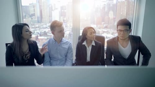 Diverse Team Having Meeting in Urban Office